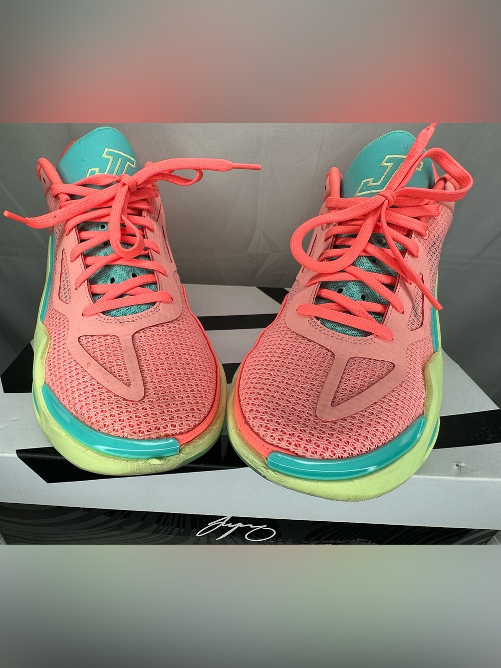 Jordan Coral Pink Athletic Sneakers with Teal and Lime Accents